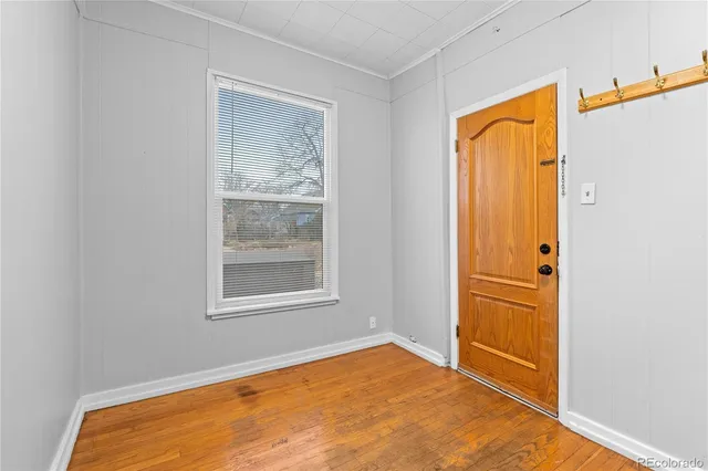 a view of an empty room and window