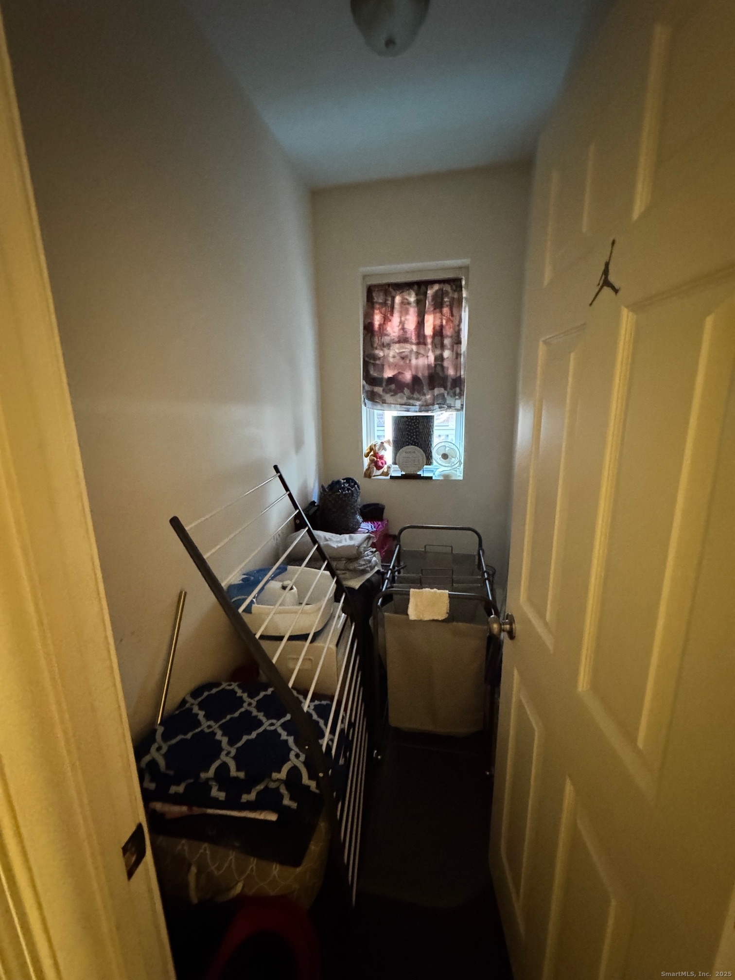 204 Magnolia Street, Unit 2S Hartford, CT 06112 - Photo 6 of 11 a view of a livingroom with furniture and a window