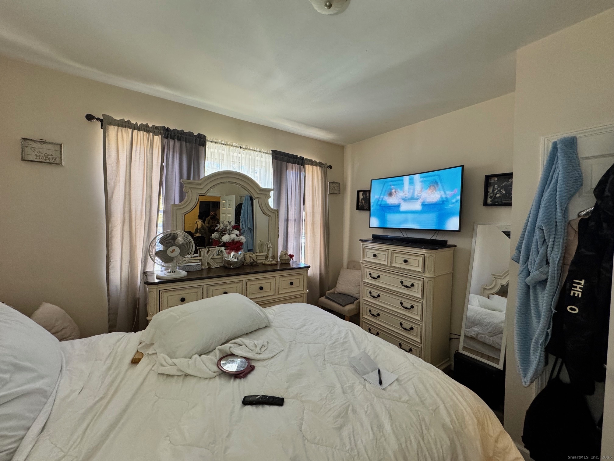 204 Magnolia Street, Unit 2S Hartford, CT 06112 - Photo 8 of 11 a bedroom with a bed and furniture