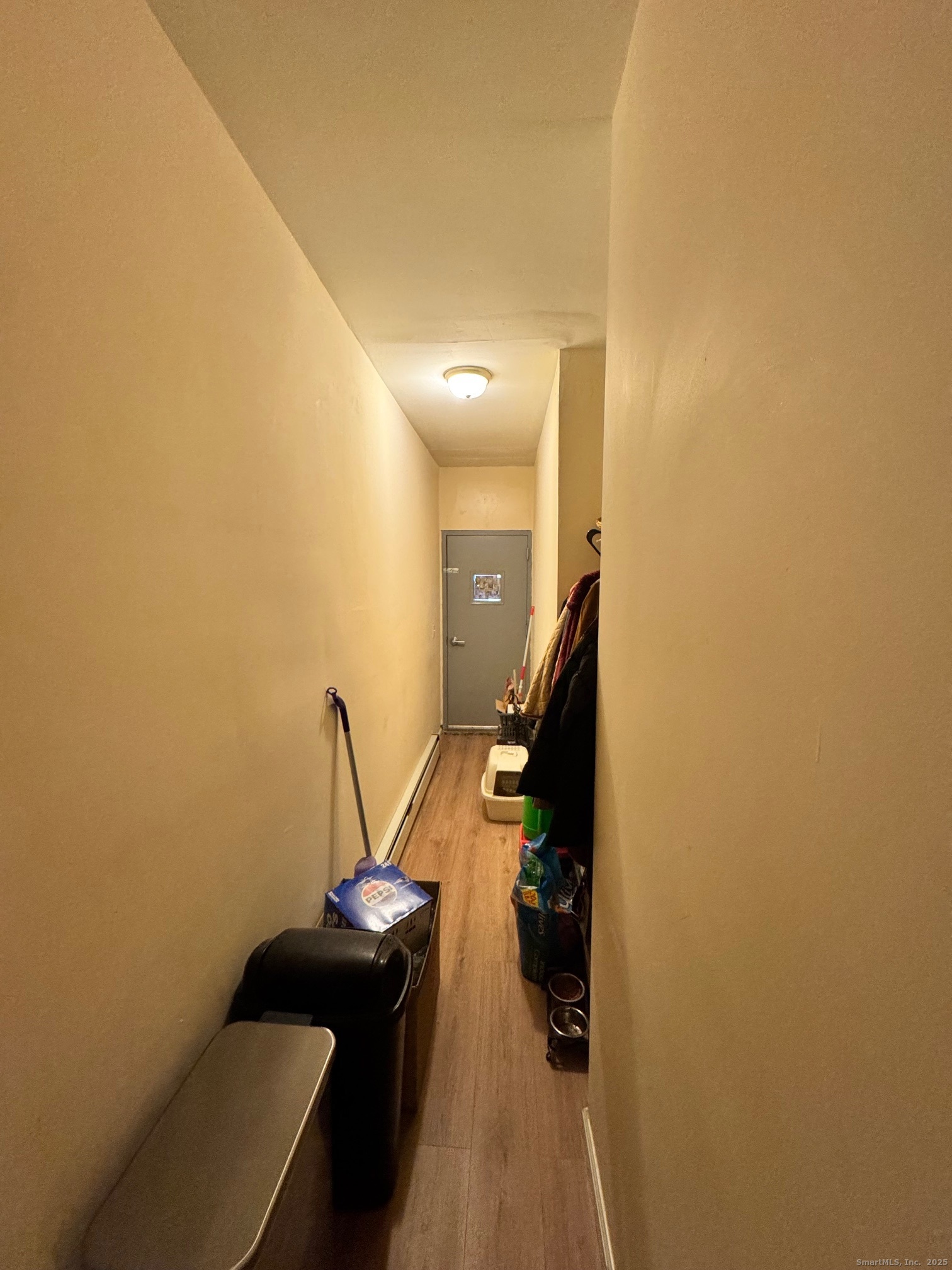 204 Magnolia Street, Unit 2S Hartford, CT 06112 - Photo 10 of 11 a view of a hallway with windows