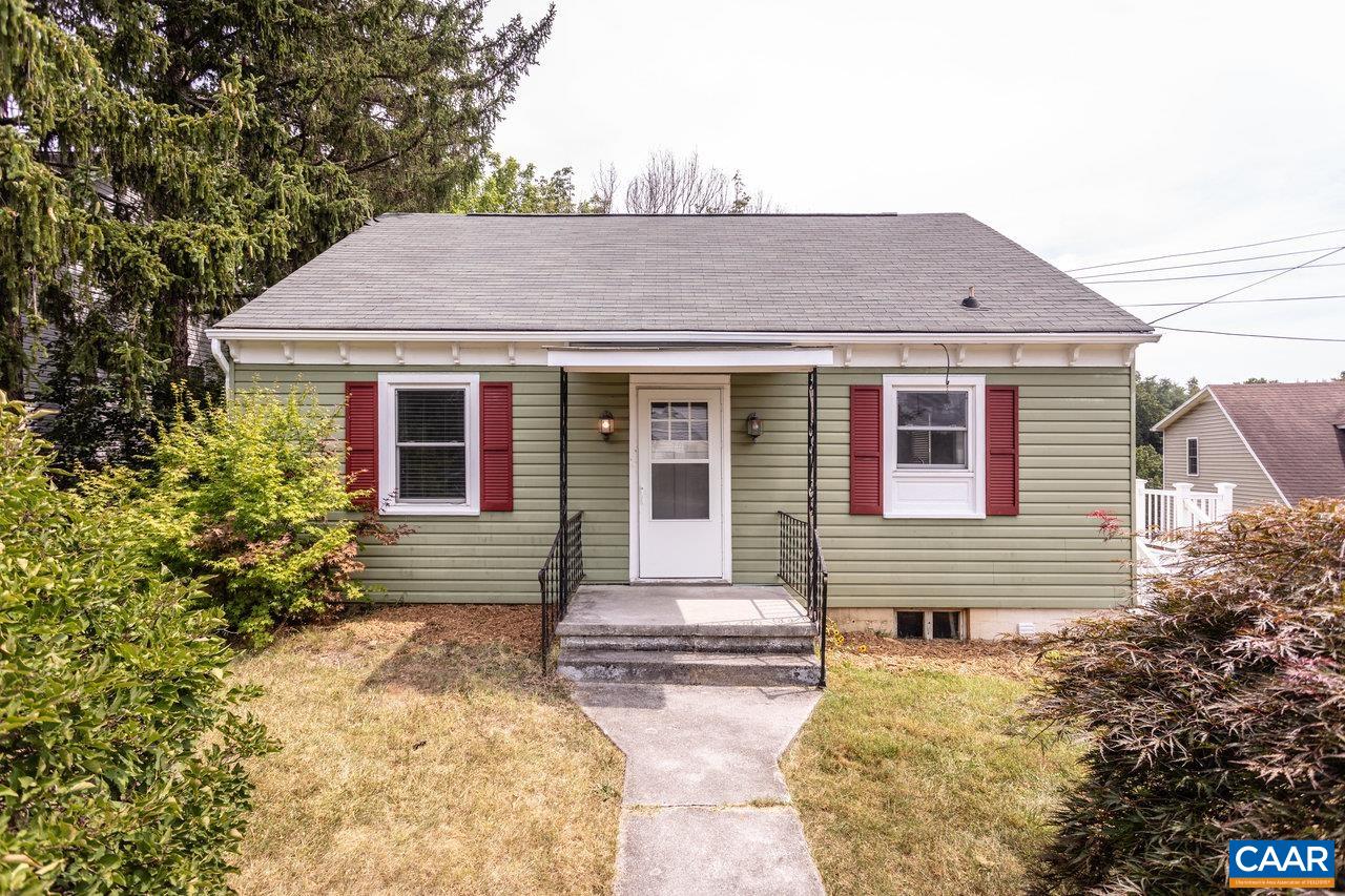 703 Monroe Street Staunton, VA 24401 - Photo 1 of 46 a front view of a house with a yard