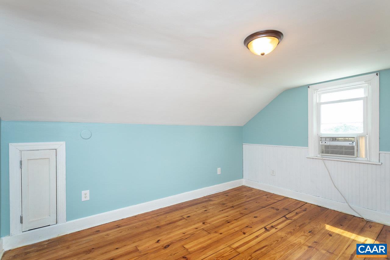 703 Monroe Street Staunton, VA 24401 - Photo 24 of 46 a view of a room with wooden floor and fan