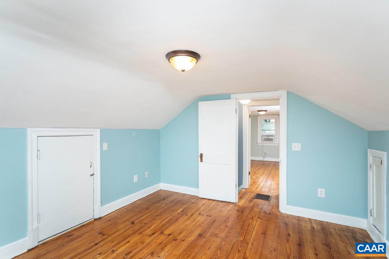 703 Monroe Street Staunton, VA 24401 - Photo 26 of 46 a view of empty room with wooden floor