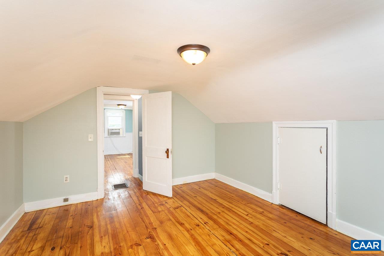 703 Monroe Street Staunton, VA 24401 - Photo 28 of 46 a view of empty room with wooden floor