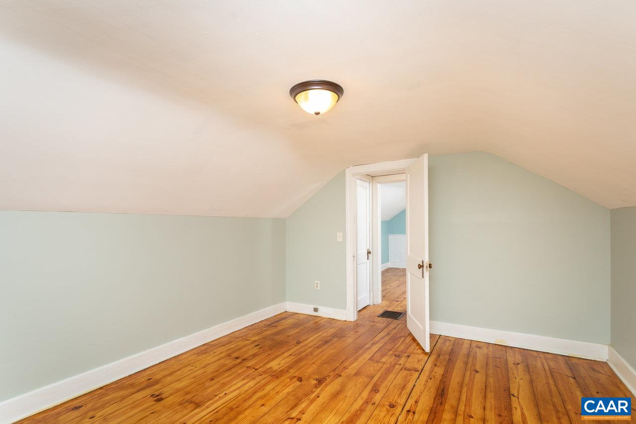 703 Monroe Street Staunton, VA 24401 - Photo 29 of 46 a view of a room with wooden floor and fan