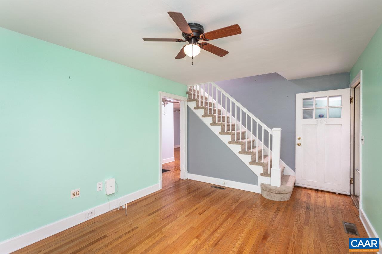 703 Monroe Street Staunton, VA 24401 - Photo 5 of 46 a view of room with wooden floor