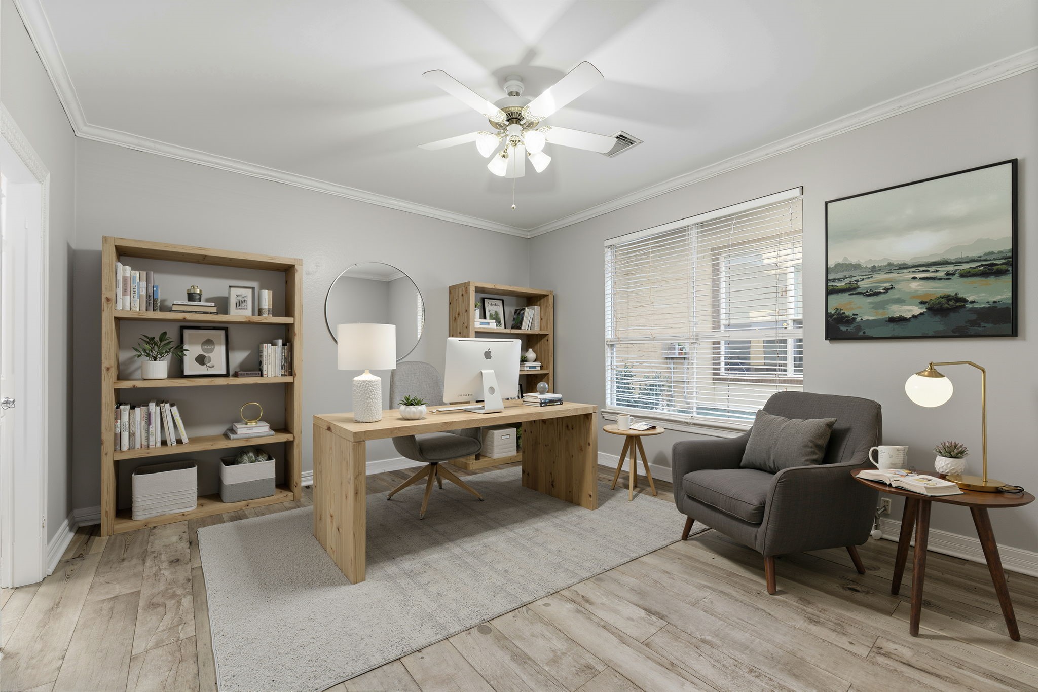 827 Rosine Street Houston, TX 77019 - Photo 5 of 50 This virtually staged, inviting home office features elegant wood flooring, abundant natural light, and stylish furnishings, creating a perfect space for productivity and relaxation.