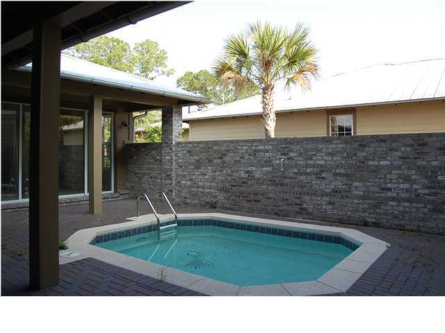 492 West Harborview Road Santa Rosa Beach, FL 32459 - Photo 2 of 16 a black and white photo of a house