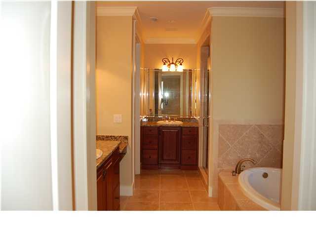 492 West Harborview Road Santa Rosa Beach, FL 32459 - Photo 11 of 16 a bathroom with a tub shower and sink