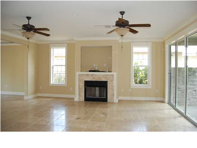 492 West Harborview Road Santa Rosa Beach, FL 32459 - Photo 4 of 16 a living room with furniture and a fireplace