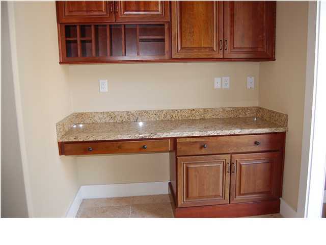 492 West Harborview Road Santa Rosa Beach, FL 32459 - Photo 6 of 16 a kitchen with stainless steel appliances granite countertop a sink dishwasher stove and cabinets