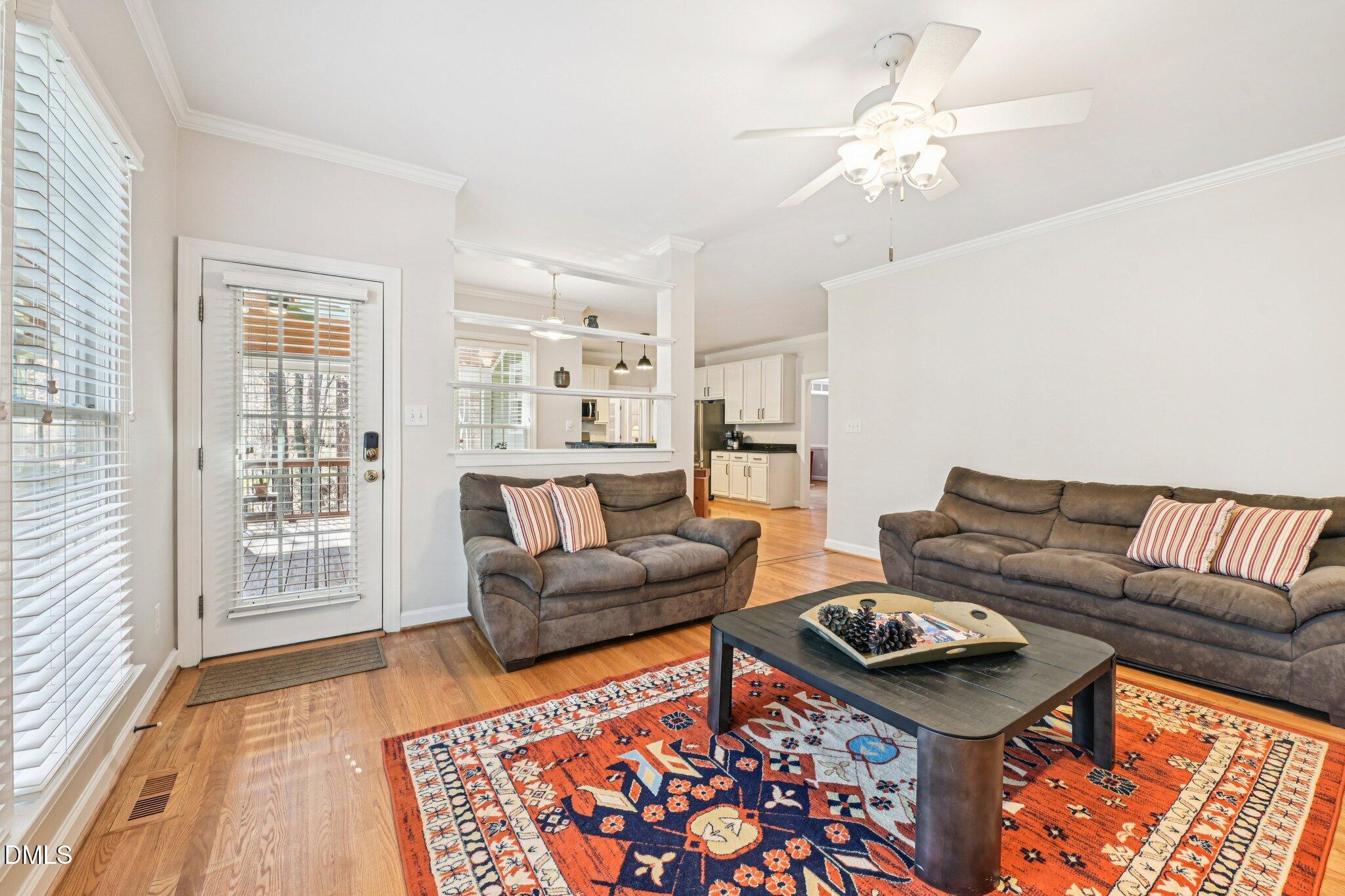 2013 Kinleys Way Raleigh, NC 27613 - Photo 20 of 68 a living room with furniture and a rug