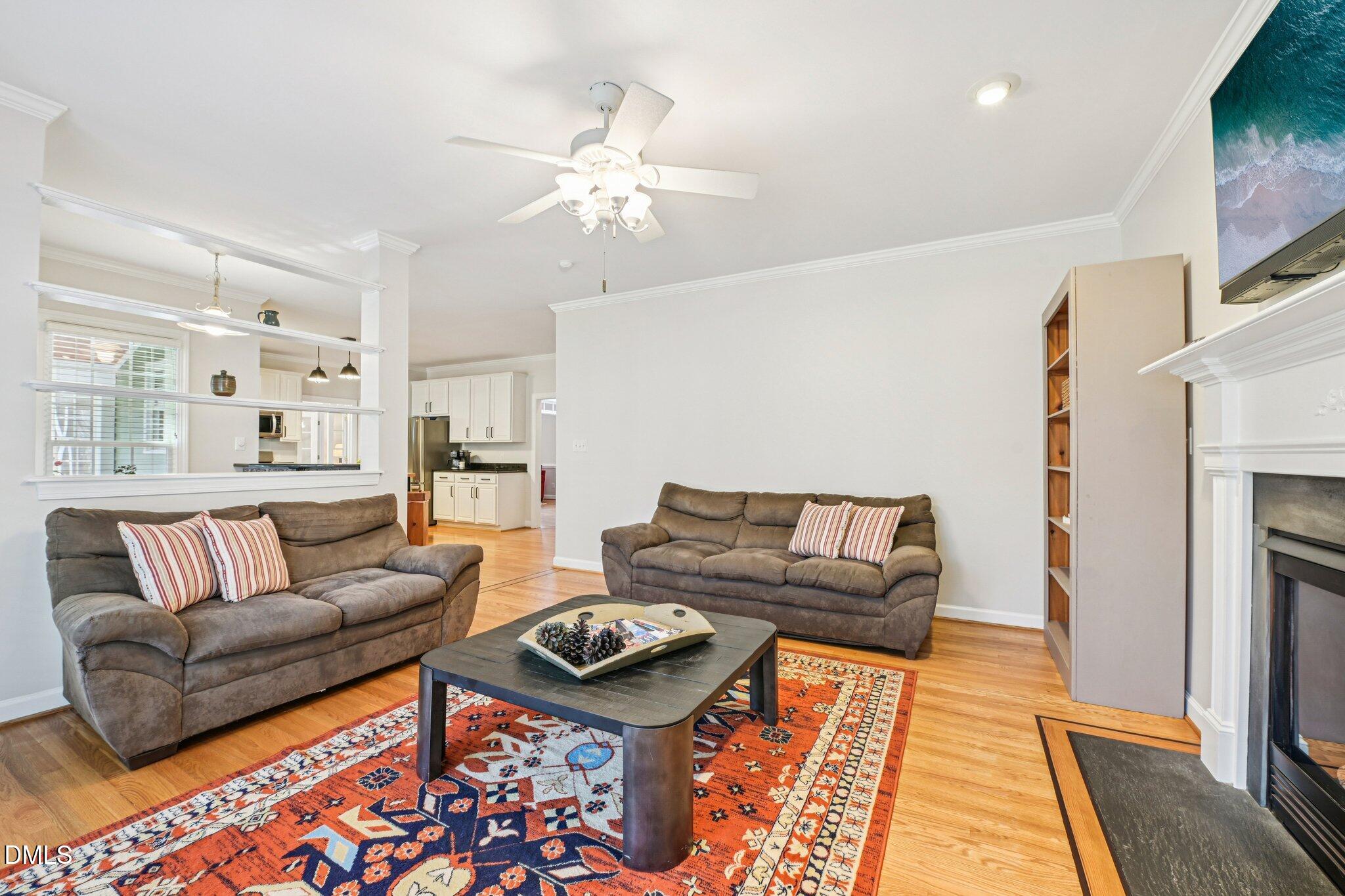 2013 Kinleys Way Raleigh, NC 27613 - Photo 21 of 68 a living room with furniture and a fireplace