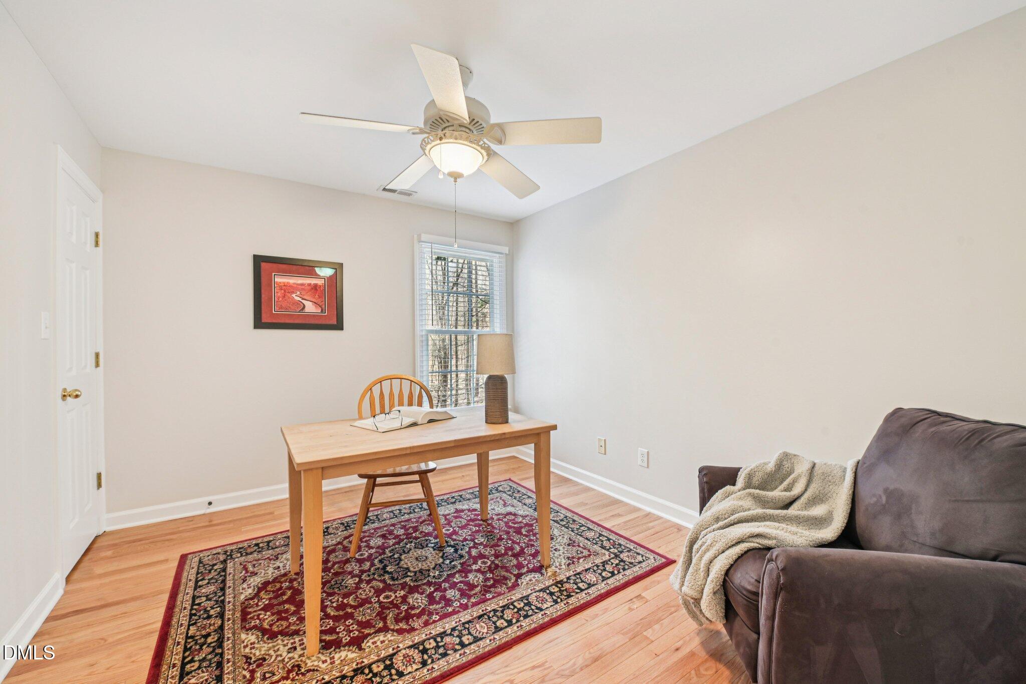 2013 Kinleys Way Raleigh, NC 27613 - Photo 35 of 68 a living room with furniture and a rug