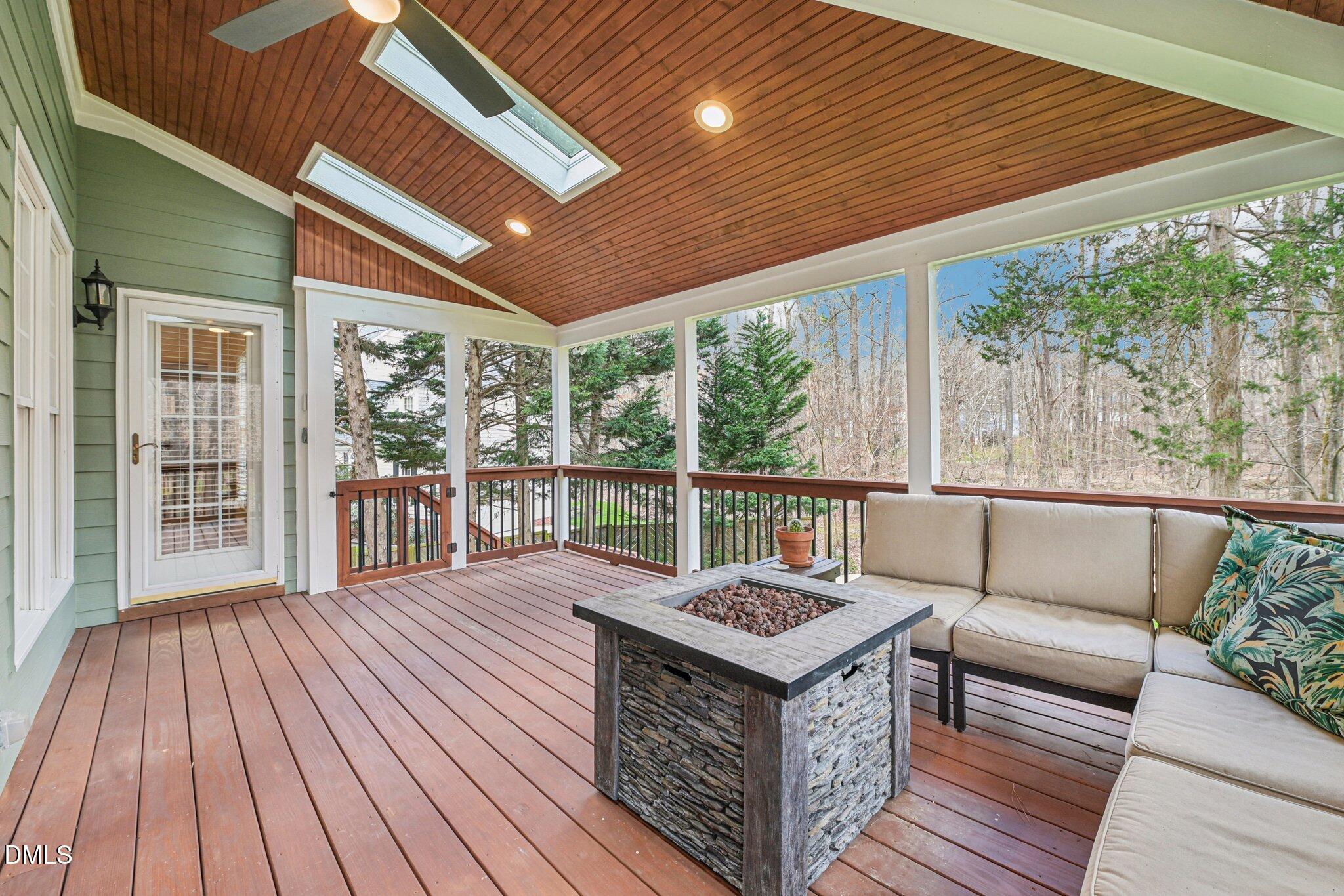 2013 Kinleys Way Raleigh, NC 27613 - Photo 47 of 68 a balcony with furniture and wooden floor