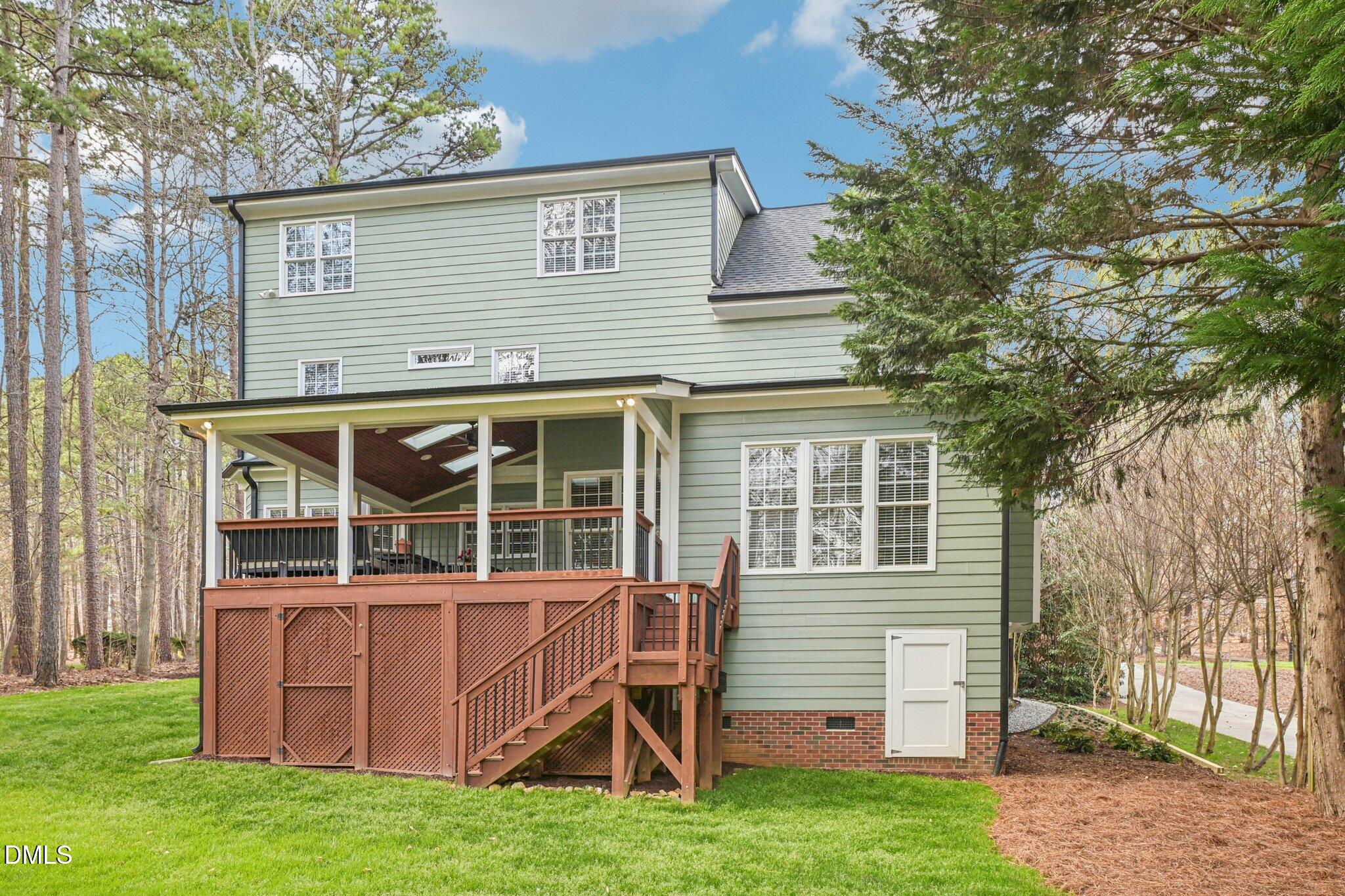 2013 Kinleys Way Raleigh, NC 27613 - Photo 50 of 68 a view of a house with a yard