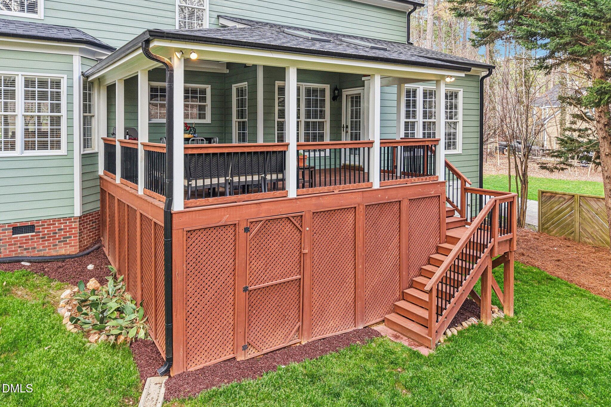 2013 Kinleys Way Raleigh, NC 27613 - Photo 52 of 68 front view of a house with a yard