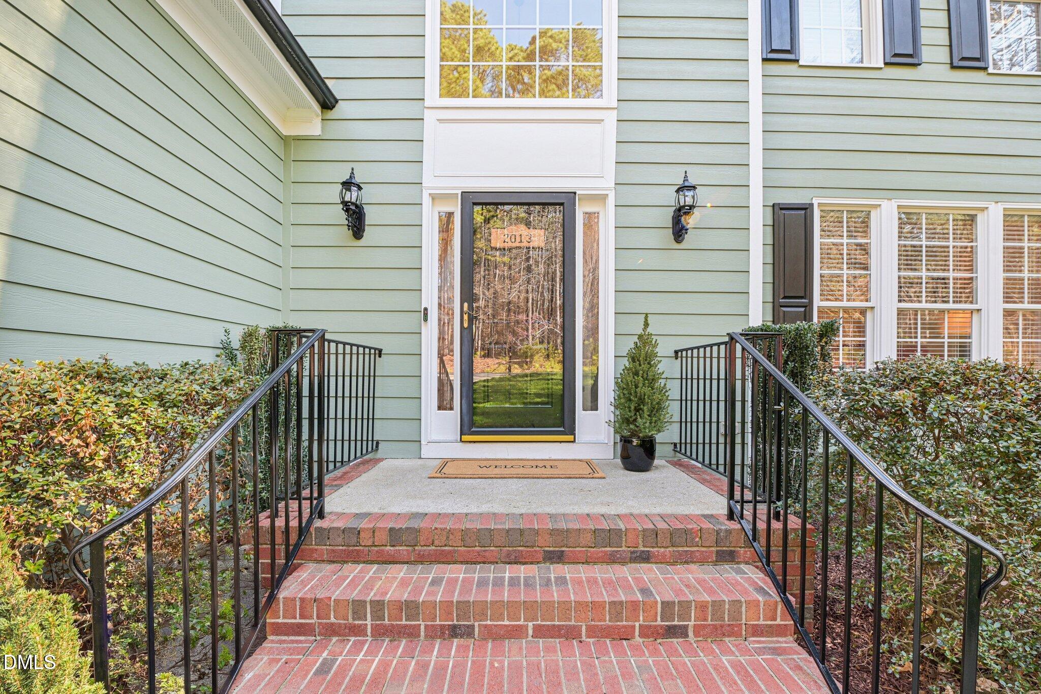 2013 Kinleys Way Raleigh, NC 27613 - Photo 7 of 68 a view of a balcony with wooden floor