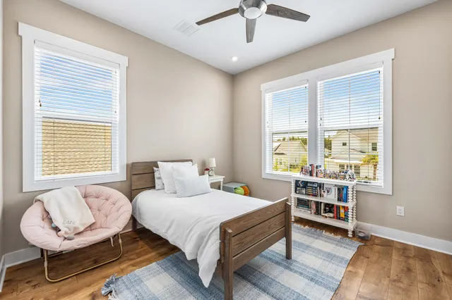 a bathroom with a sink a toilet and shower curtain