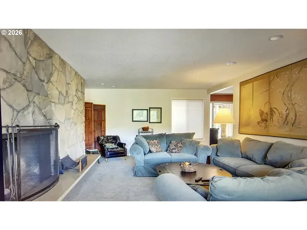 a living room with furniture and a couch