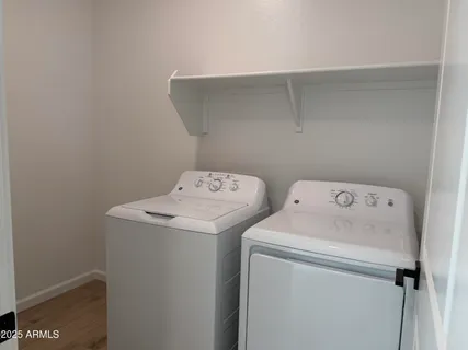 a utility room with dryer and washer