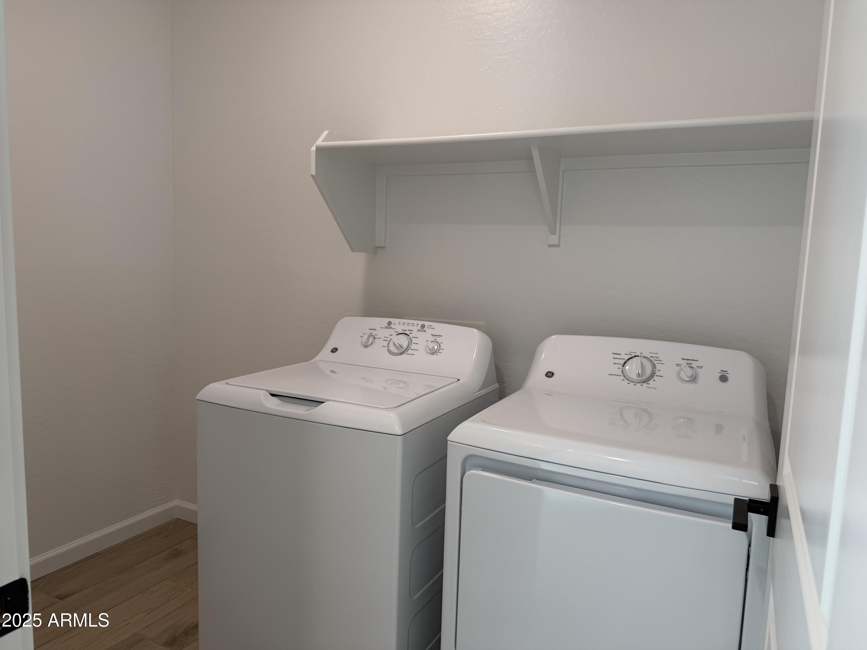 5533 West Buist Avenue Laveen, AZ 85339 - Photo 21 of 42 a utility room with dryer and washer