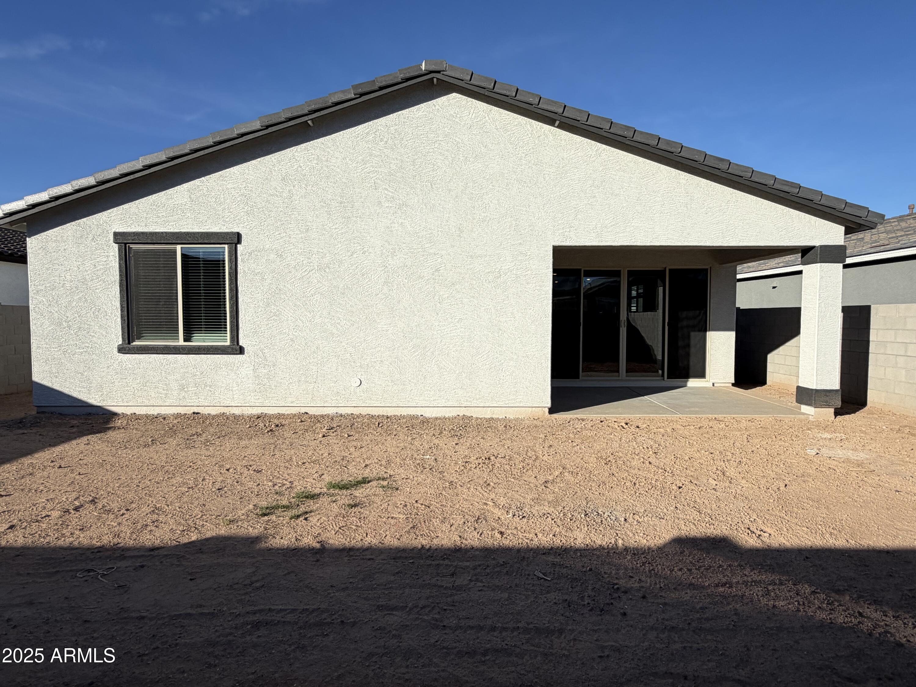 5533 West Buist Avenue Laveen, AZ 85339 - Photo 28 of 42 a view of an house with backyard