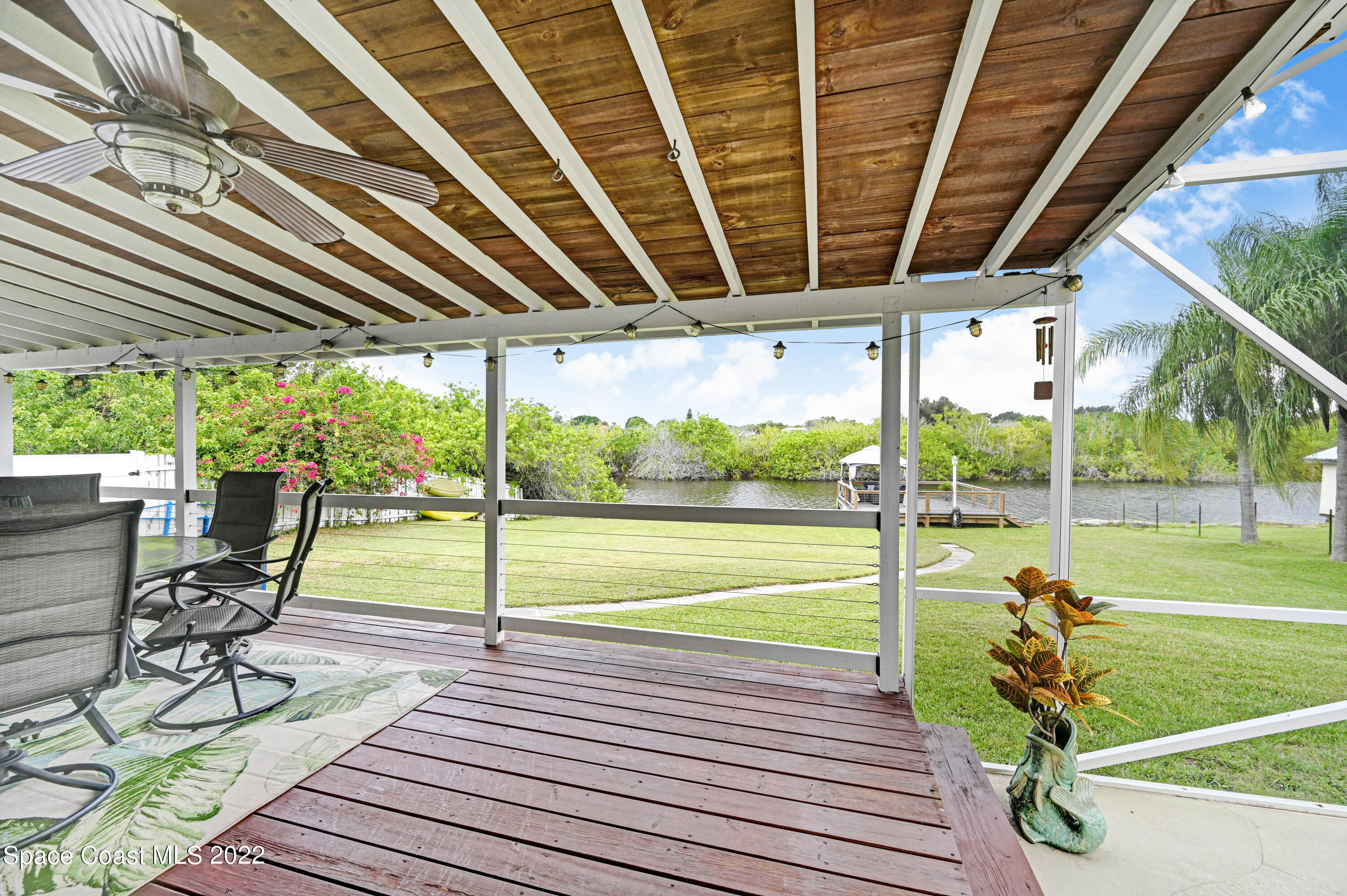 1304 Lichty Street Palm Bay, FL 32905 - Photo 31 of 57 a view of a swimming pool with a porch