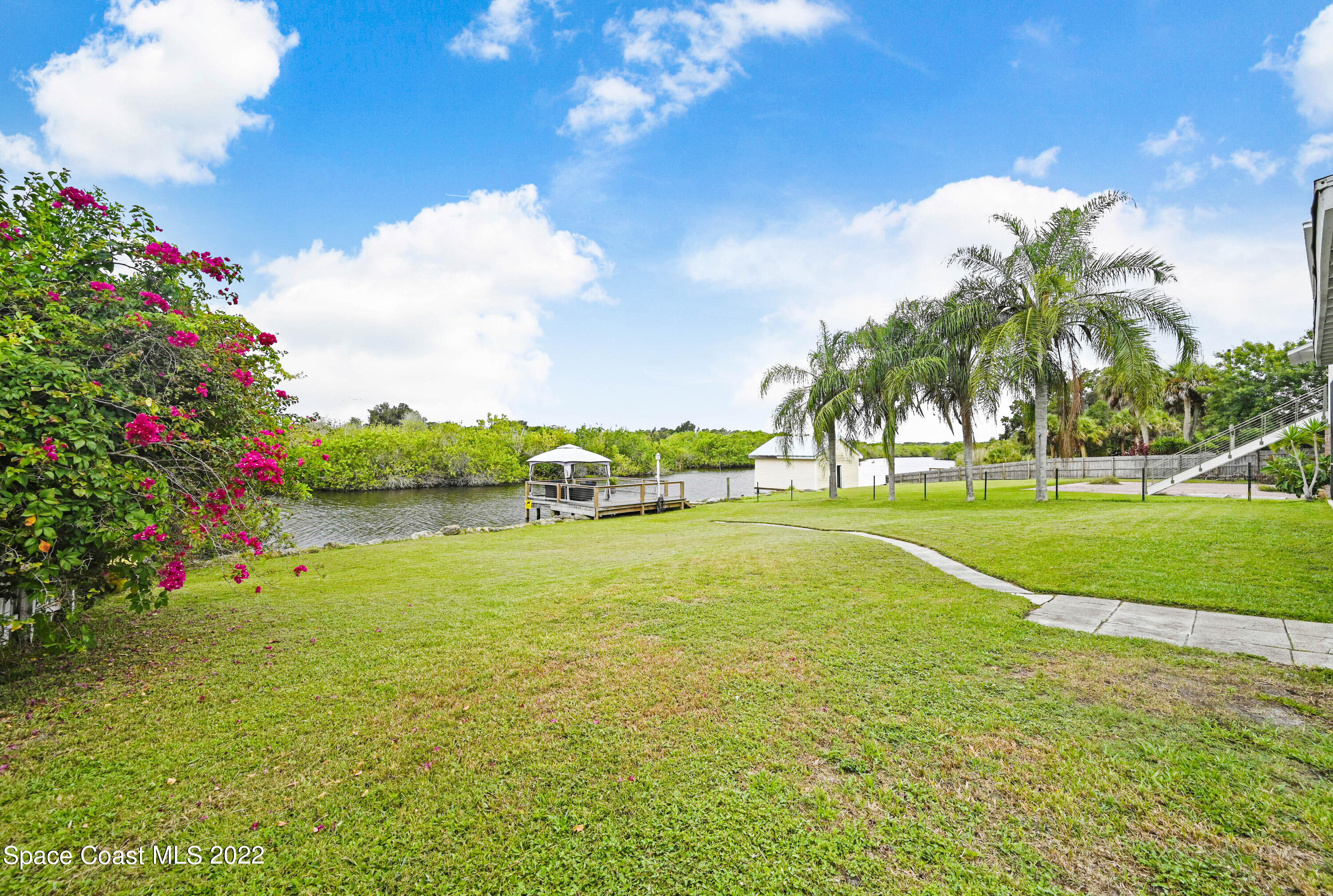 1304 Lichty Street Palm Bay, FL 32905 - Photo 38 of 57 a view of a water fountain and a big yard