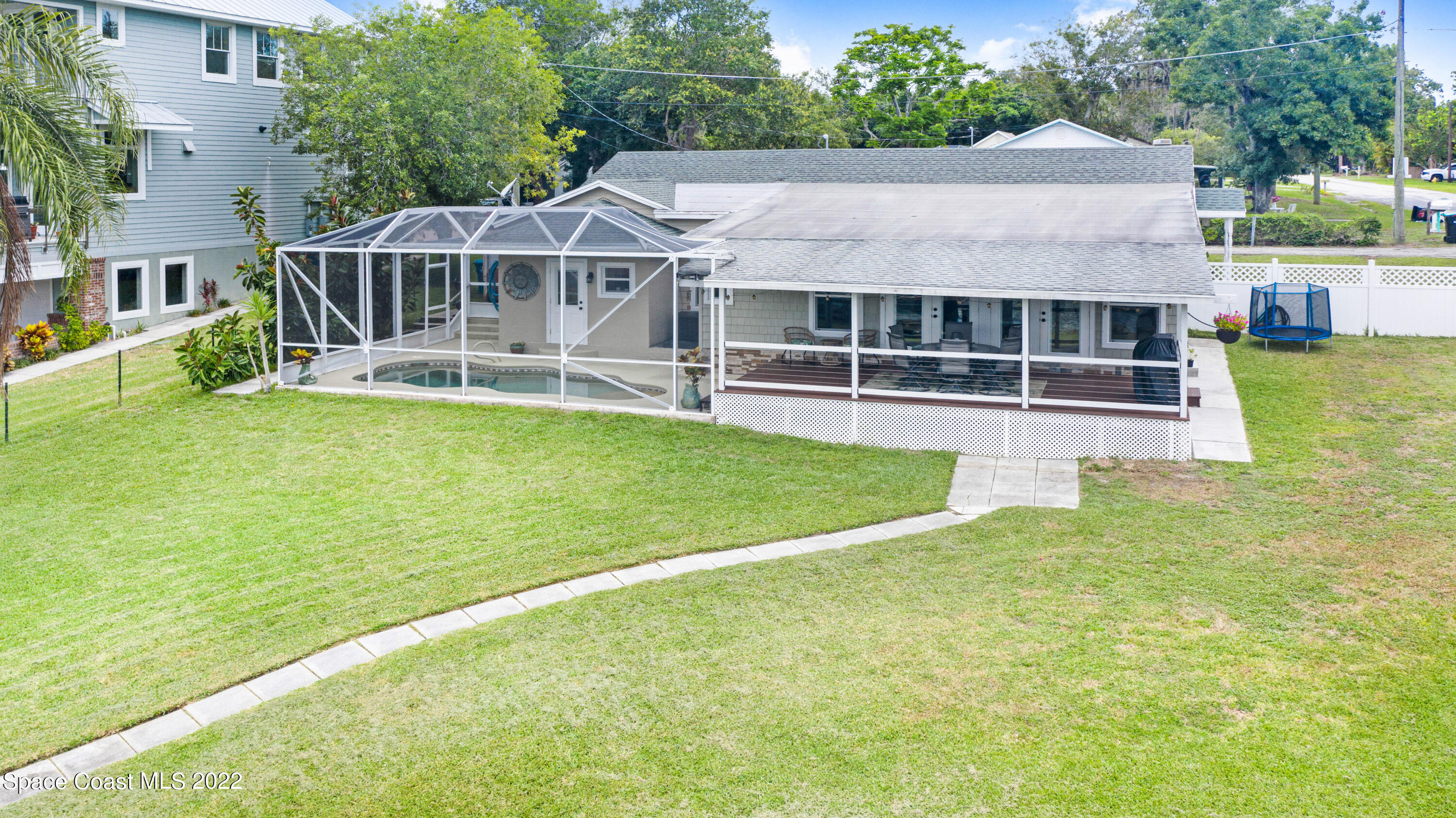 1304 Lichty Street Palm Bay, FL 32905 - Photo 39 of 57 a view of a house with a swimming pool
