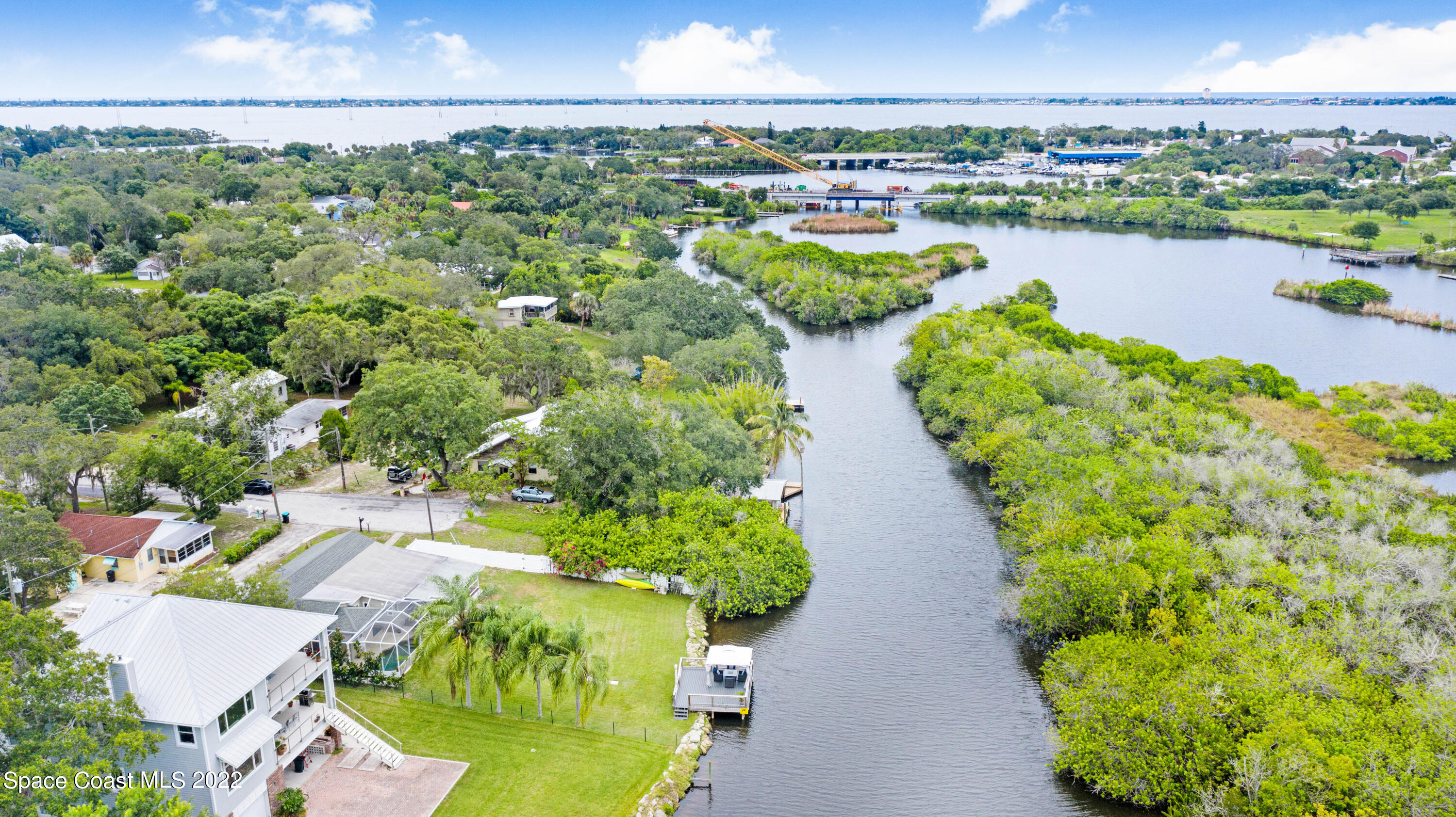 1304 Lichty Street Palm Bay, FL 32905 - Photo 47 of 57 a view of a lake with a city