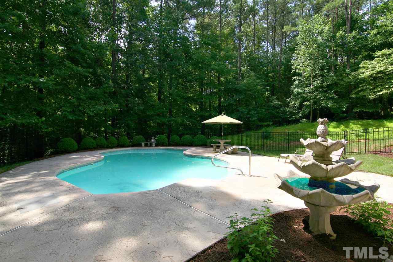 5812 Rock Canyon Road Raleigh, NC 27613 - Photo 22 of 24 a view of a backyard