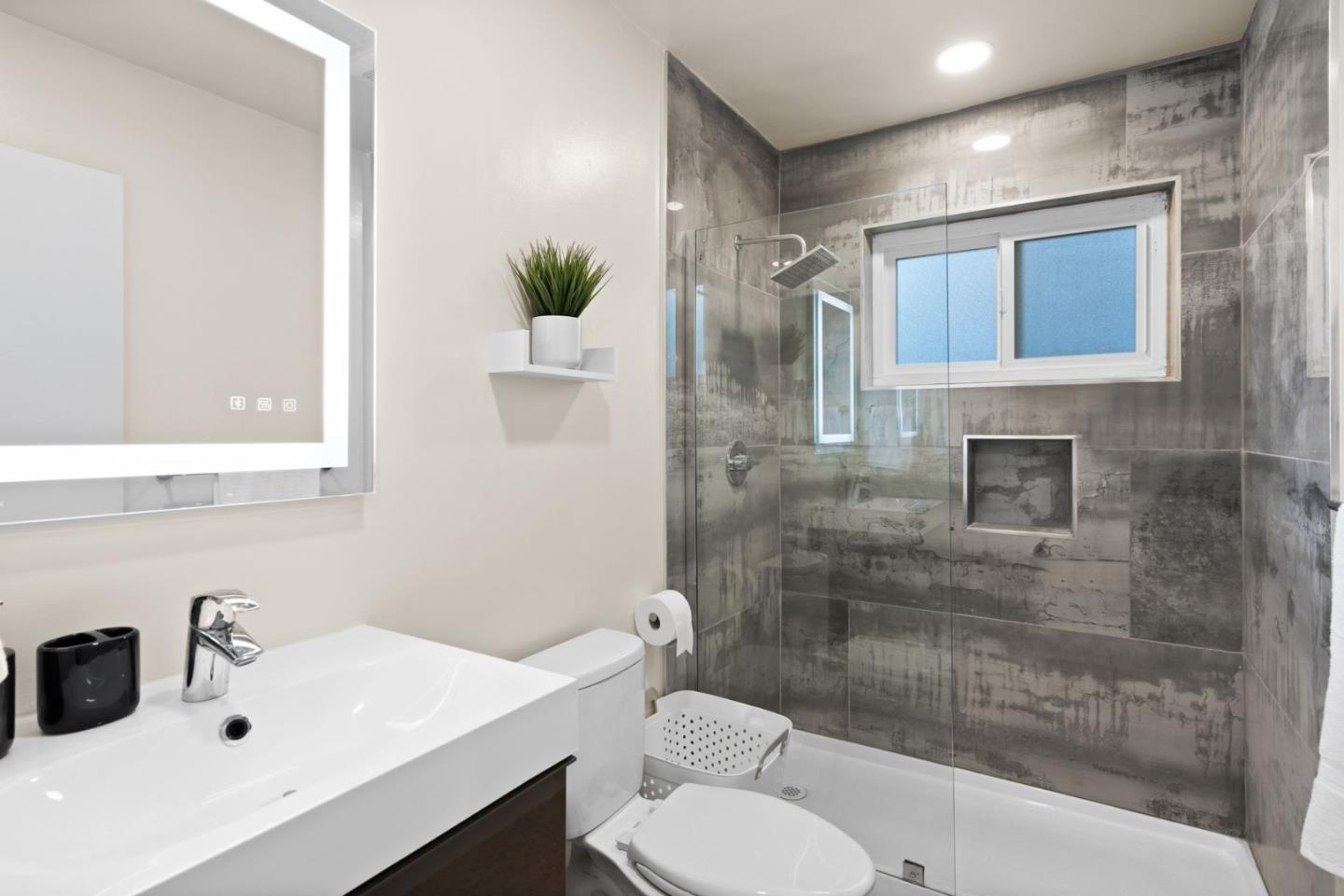 430 Dunster Drive Campbell, CA 95008 - Photo 19 of 31 a bathroom with a sink toilet and shower