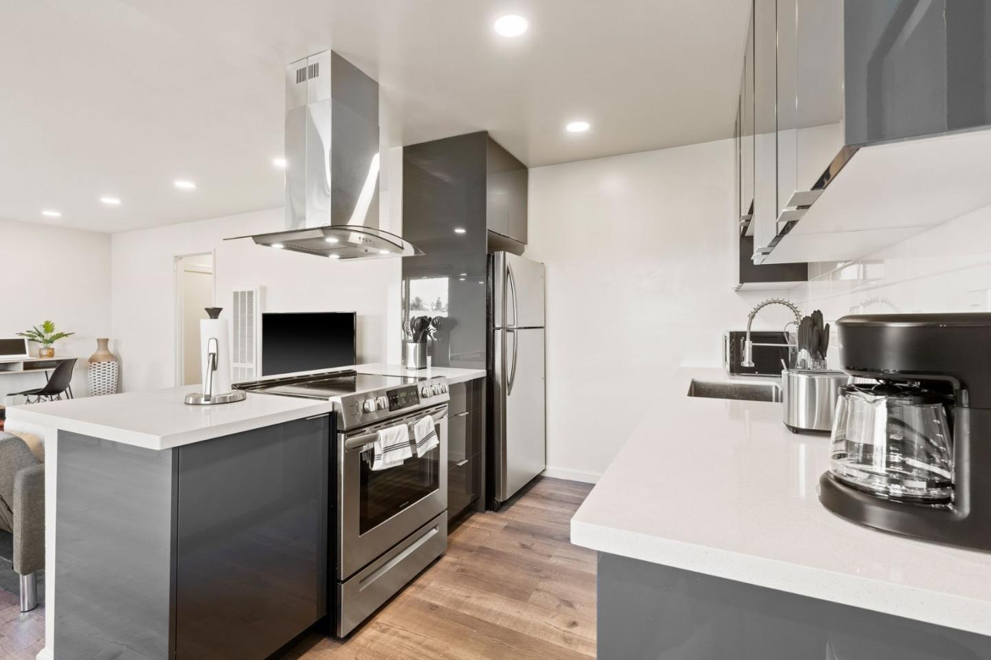 430 Dunster Drive Campbell, CA 95008 - Photo 21 of 31 a kitchen with a sink appliances and cabinets