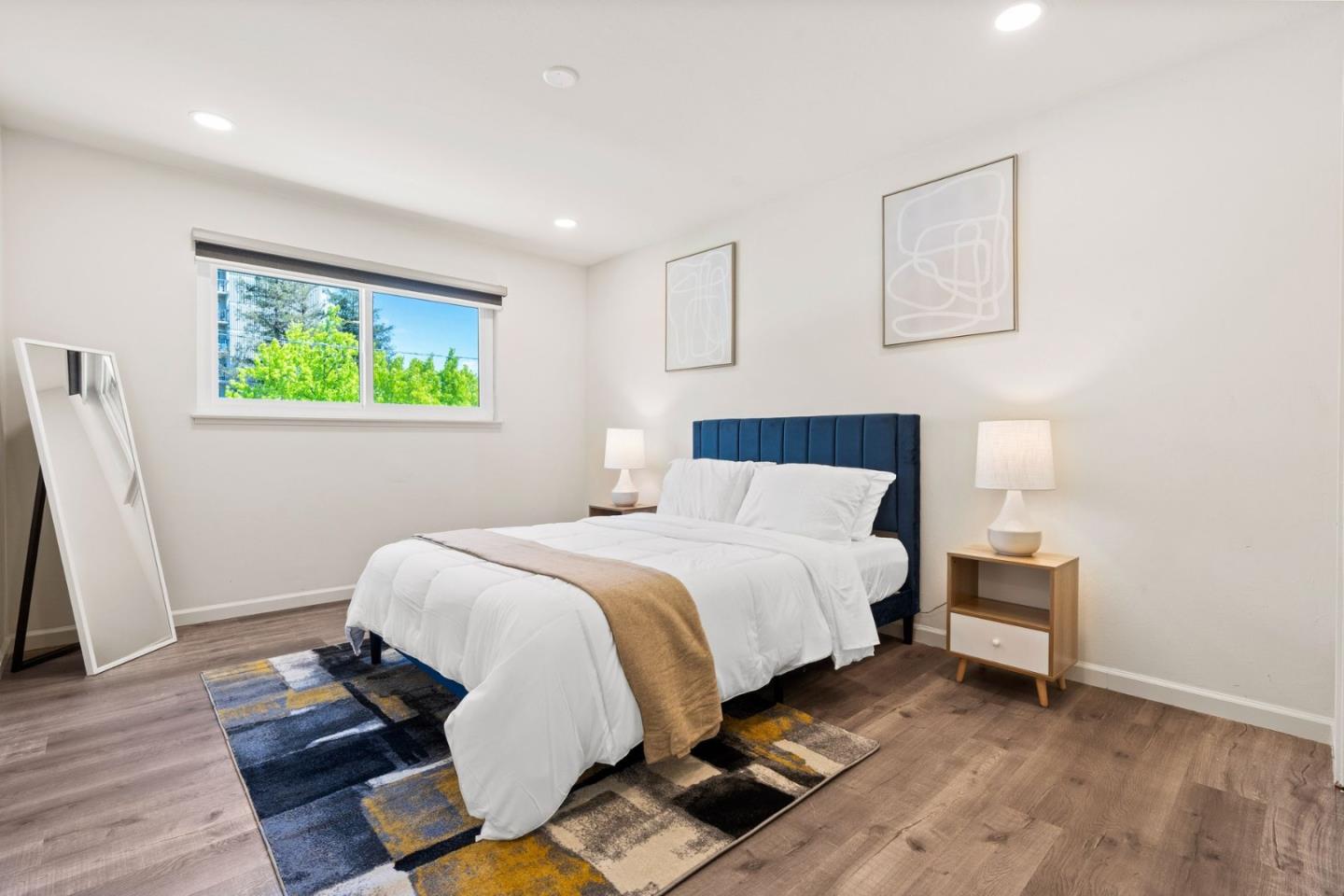 430 Dunster Drive Campbell, CA 95008 - Photo 27 of 31 a bedroom with a bed and a window