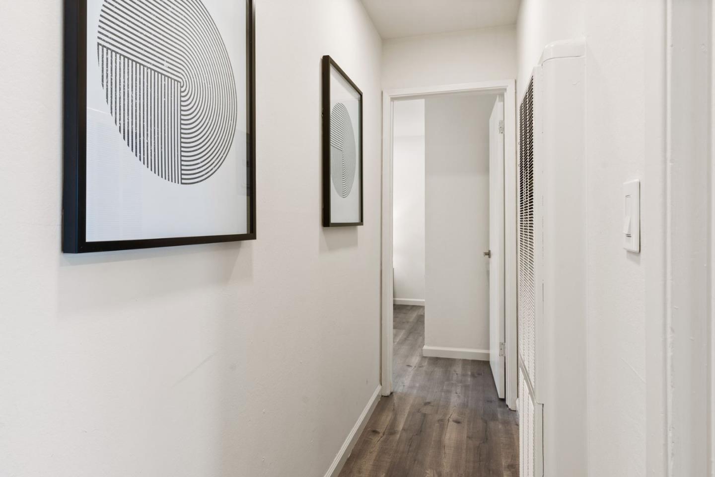 430 Dunster Drive Campbell, CA 95008 - Photo 30 of 31 a view of a hallway with wooden floor