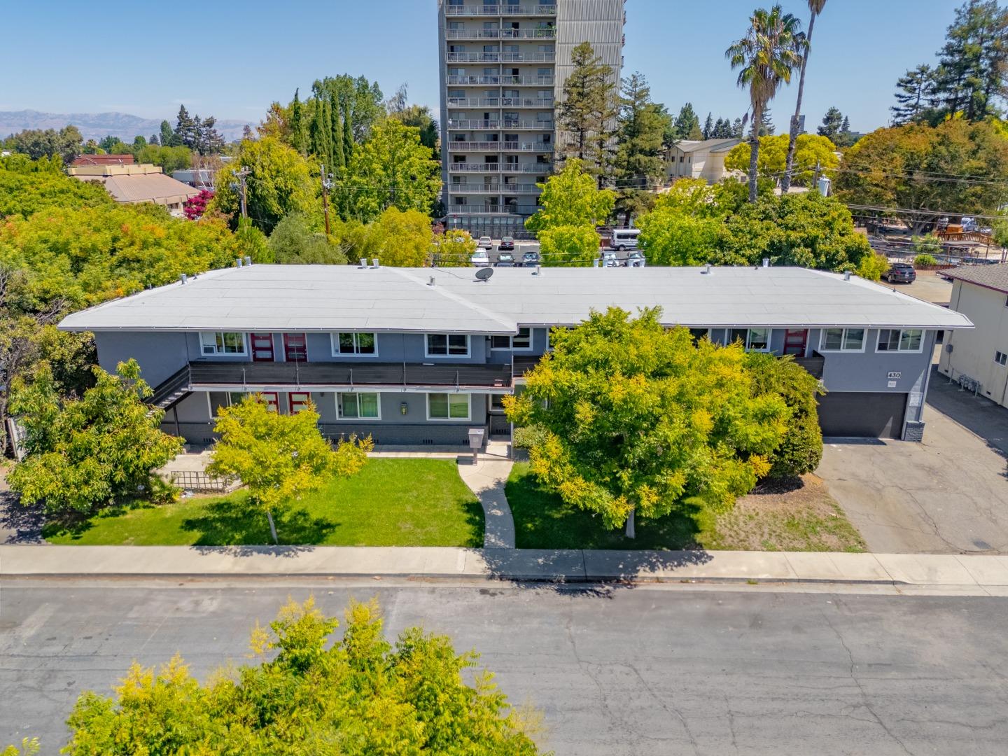 430 Dunster Drive Campbell, CA 95008 - Photo 3 of 31 a view of a swimming pool with potted plants