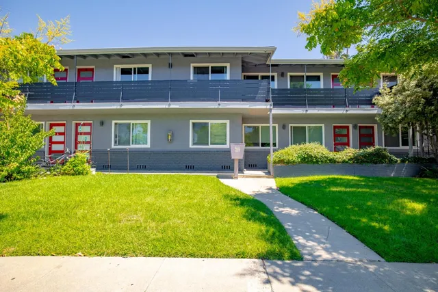 a aerial view of a house with a yard