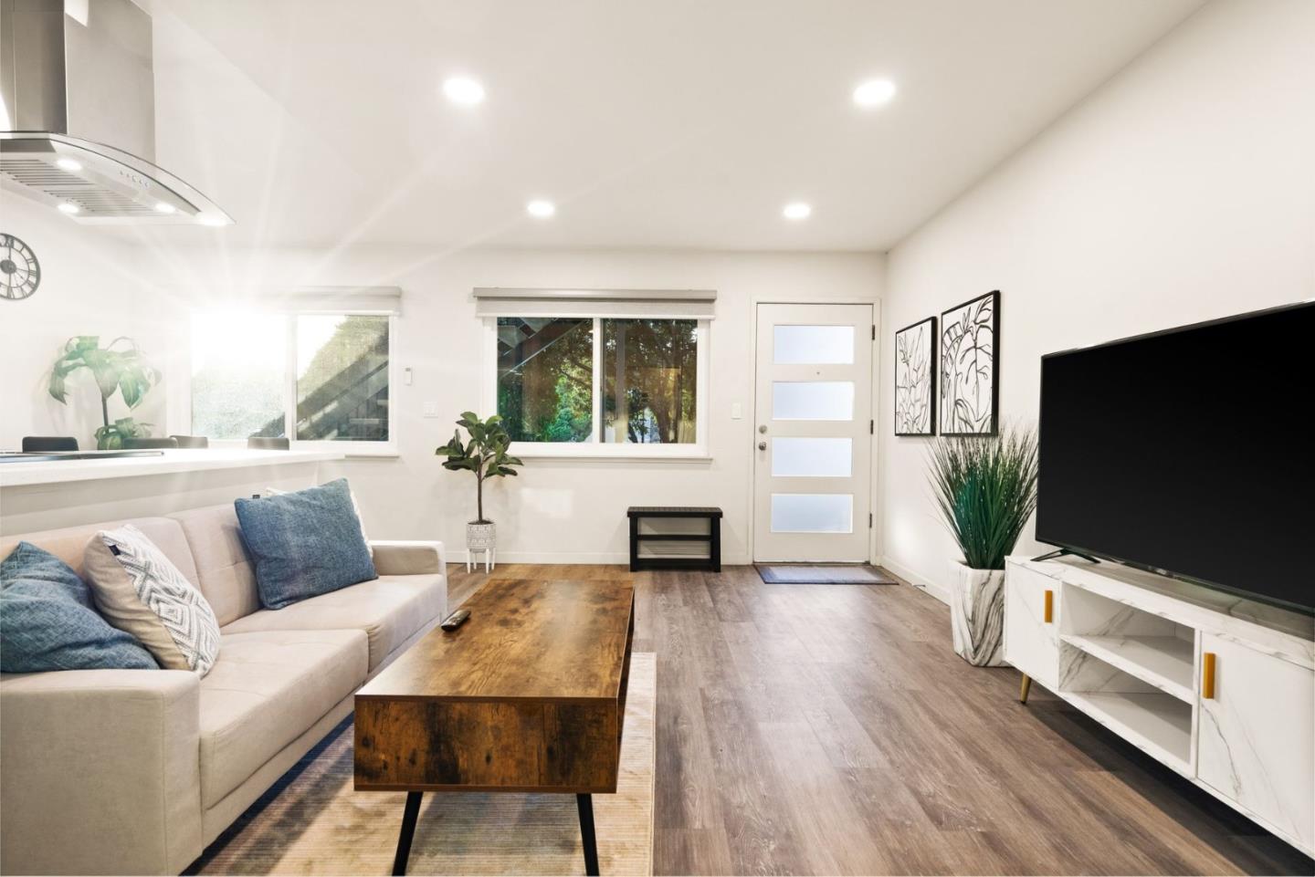 430 Dunster Drive Campbell, CA 95008 - Photo 9 of 31 a living room with furniture and a flat screen tv