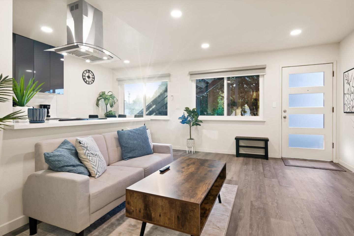 430 Dunster Drive Campbell, CA 95008 - Photo 10 of 31 a living room with furniture and a large window