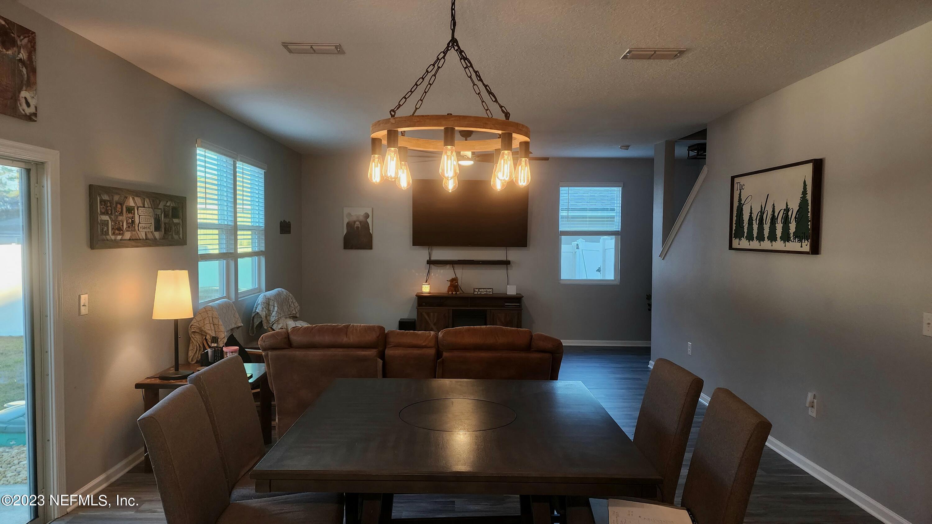 3822 Bronco Road Middleburg, FL 32068 - Photo 8 of 37 a view of a dining room with furniture