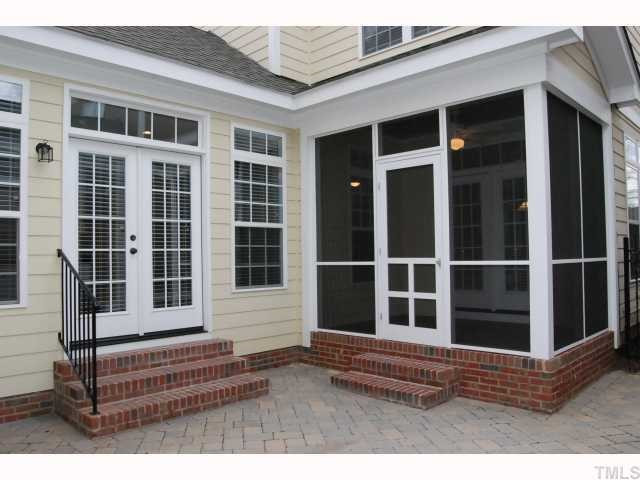 1209 North Blount Street Raleigh, NC 27604 - Photo 11 of 12 Private Courtyard with French Doors to the Sunroom & a Screened Porch with Ceiling Fan & French Doors to the Eat-in Area.