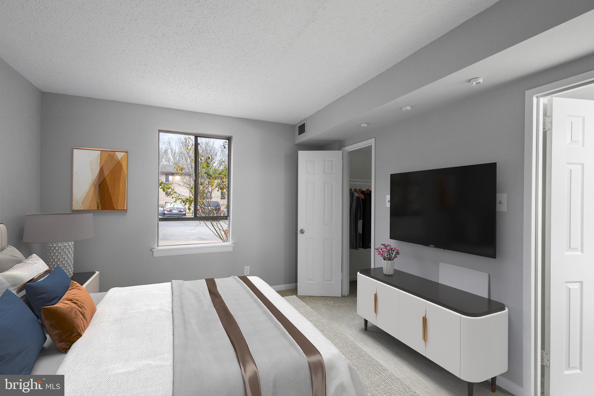 11654 Stoneview Square, Unit 94/1B Reston, VA 20191 - Photo 19 of 46 Primary Bedroom - Virtually Staged