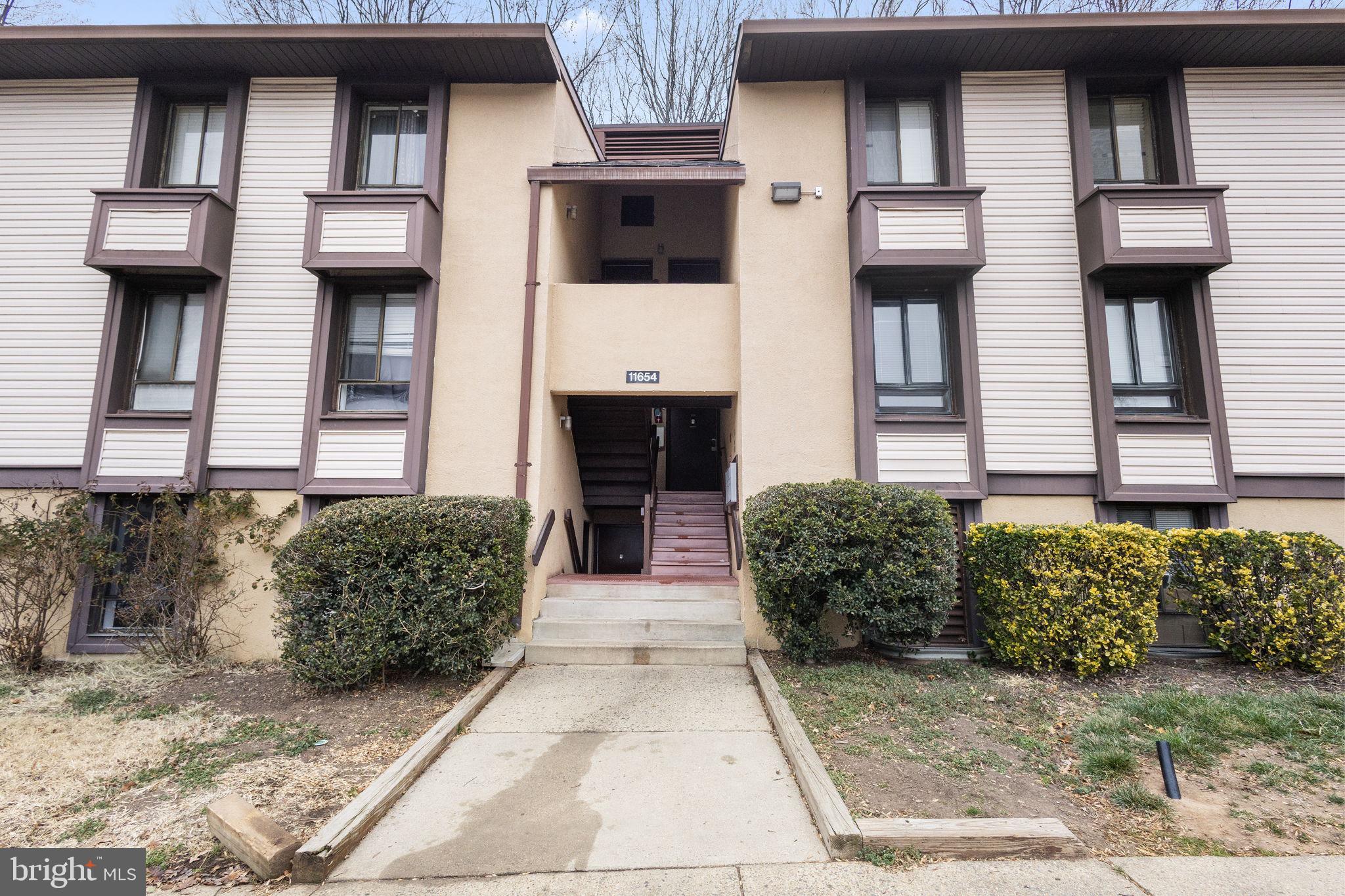 11654 Stoneview Square, Unit 94/1B Reston, VA 20191 - Photo 2 of 46 Front Exterior