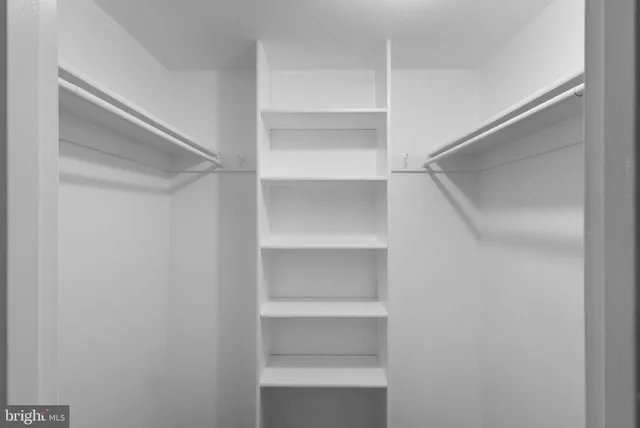 a bathroom with a close shower view