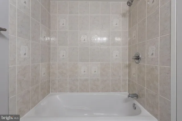 a view of a room that has a large window