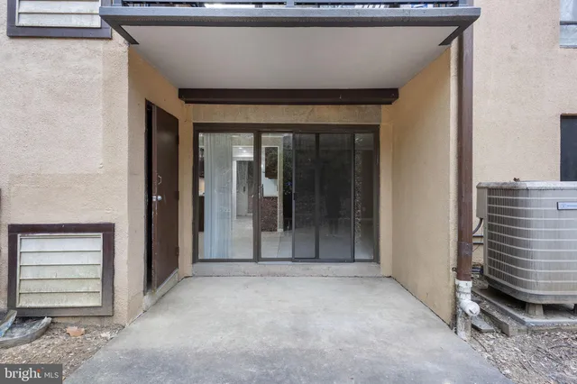 a view of a livingroom with furniture and window