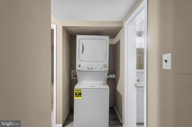 a view of a livingroom with furniture and windows