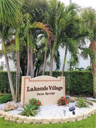 a sign on the side of the road