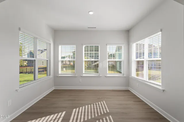 a bathroom with a granite countertop sink a mirror and a